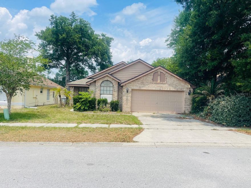 Spacious home with Fireplace in the Livingroom.  This home has potential needs TLC. Large backroom and yard. Roof is 4 Years old.