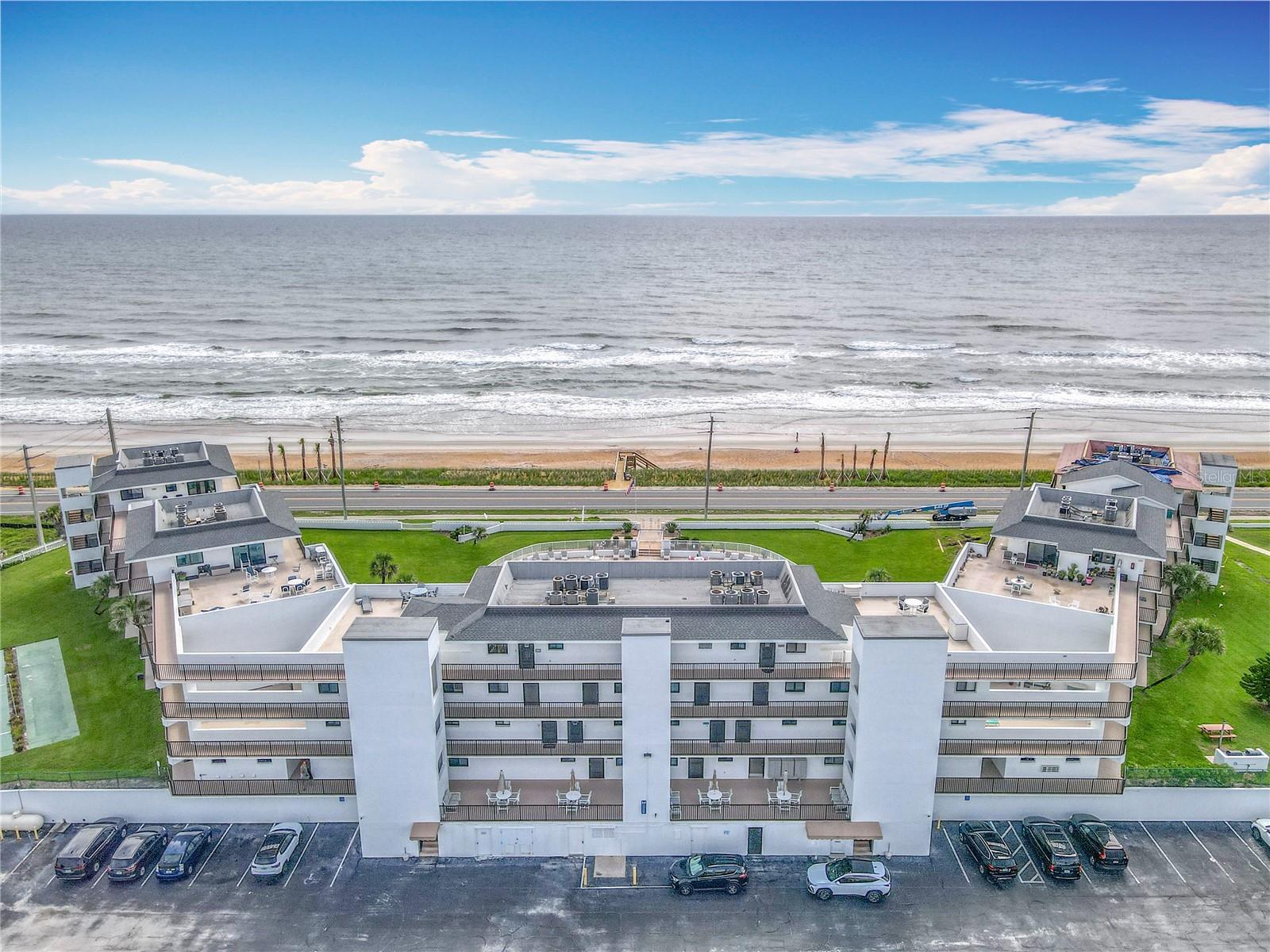 OCEANFRONT PARADISE! Rare short term rental unit in Flagler Beach with a transferable short term rental permit. This dream coastal retreat is beautifully upgraded and fully furnished. Step inside this 2 bedroom 2 1/2 bath condo and you will find an open plan with modern finishes perfect for relaxing and entertaining. The kitchen offers new appliances, freshly painted cabinets and professionally installed LED lighting. The living room and dining area flow seamlessly, creating an airy, beachside ambiance. This fully furnished condo has new furniture and is move in ready! Enjoy the resort style amenities, including a large pool, tennis courts and lush grounds. If you are looking for a permanent residence, a vacation getaway or investment property, Don't miss this opportunity to own paradise just steps from the sand. This turn-key condo delivers luxury and unbeatable oceanfront living.