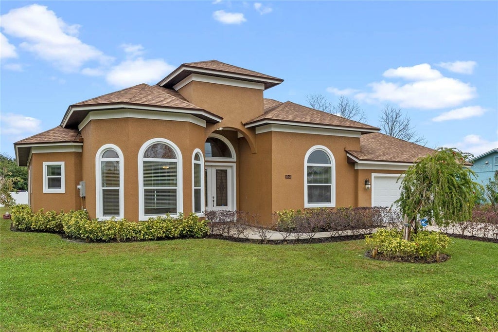Photo of 1943 Sipes Avenue, Sanford, FL 32771 (MLS # O6441084)