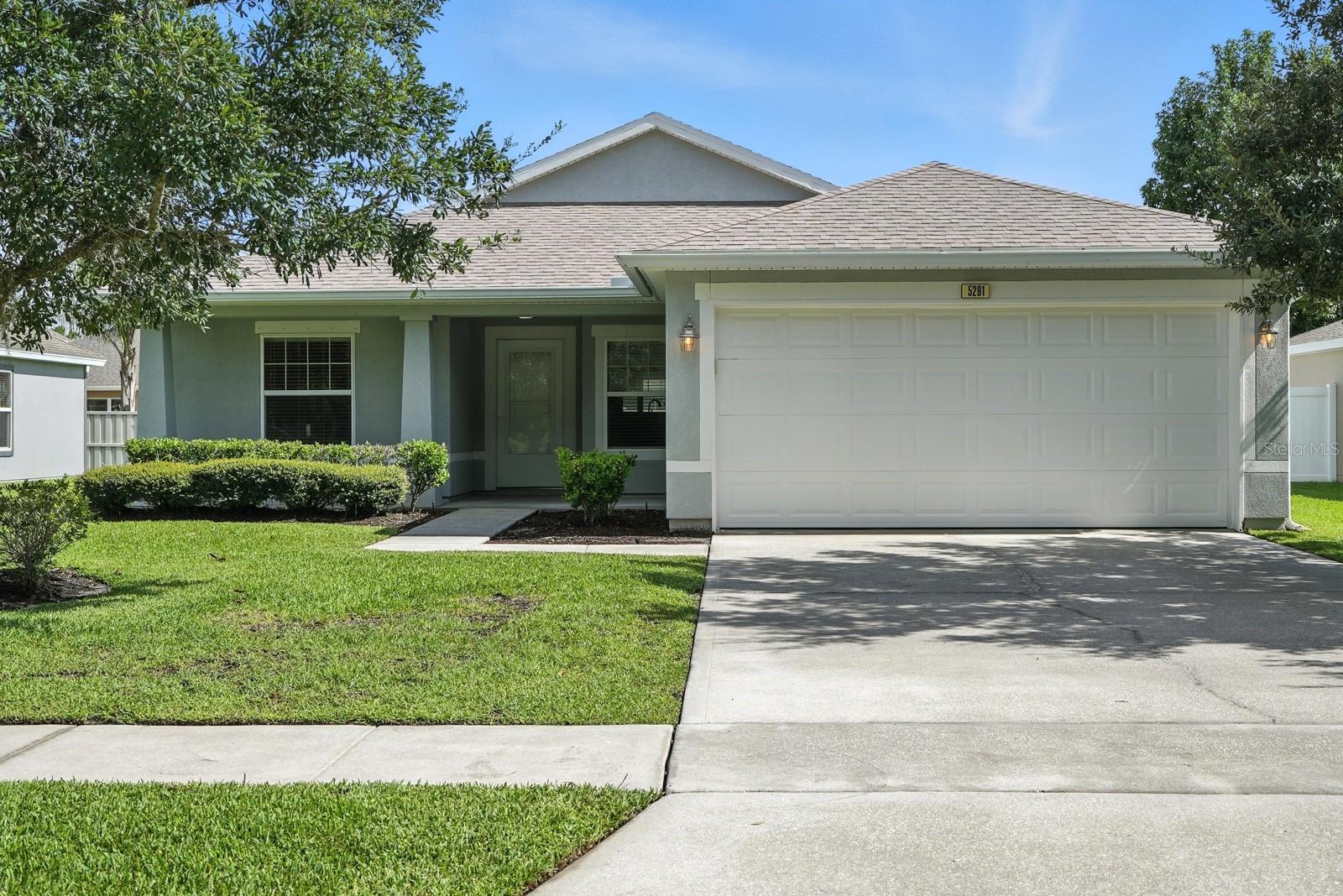 Come tour this newly renovated turn-key, move-in-ready home in the private community of Port Orange Plantation.
The home is open & bright with tall ceilings, new LVP flooring and crown molding throughout creating a modern seamless look and a new roof that is under a 5-year workmanship warranty and shingle manufacturers material warranty. As you enter the home you enter a room through a graceful archway on the left that can be used as an office, den or large dining room. The modern chef’s kitchen has an eat in area for a dinette set and includes NEW quartz countertops, a NEW stainless-steel refrigerator, double-oven and 42” cabinets. A large pantry has NEW California closet shelving for more than ample storage and great organization. A breakfast bar is situated between the kitchen and the large great room where a NEW hurricane impact sliding glass door leads you to your private backyard and patio with oak trees providing shade and serenity. The NEW front door with its screen will provide amazing cross ventilation through the kitchen, great room and out to the backyard.
The Master ensuite bedroom, with a tray ceiling, has a large bathroom with a NEW walk-in-shower enclosed with glass doors, NEW granite counter tops with double sinks and a private water closet. The large walk-in-closet is custom designed with California cabinetry that includes drawers and ample shelving completing this luxurious ensuite bedroom.
This split-floor plan with gracefully arches, has two bedrooms flanking the second full bathroom offering full privacy from the Master Suite. All bedrooms have ceiling fans and upgraded shelving in closets.
The laundry room is conveniently located right off the kitchen with washer/dryer, California cabinetry and shelving for storage of all your cleaning needs. A large 2 car garage opens into the home for your safety and comfort.
The home is pre-wired for an ADT alarm system