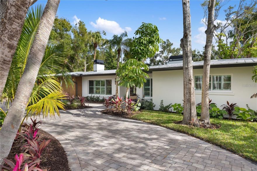 Experience elevated coastal living in this fully updated 4-bedroom, 3-bath home offering 2,529 sq. ft. of refined space in the coveted San Remo Estates community. Just steps from the North Siesta Key Bridge, this residence combines a serene neighborhood setting with exceptional convenience to Sarasota’s top waterfront amenities.

Inside, an open-concept layout highlights a newly designed kitchen with modern appliances, a dedicated laundry room, and a versatile fourth bedroom perfect for an office, gym, or flex space. Custom closets throughout the home—crafted by Design Studio California Closets—enhance storage and organization, while thoughtful finishes create a warm, contemporary feel. A spacious 2-car garage, and U-shaped driveway adds everyday practicality.

Set on a generous 0.33-acre lot, the large outdoor space is designed for entertaining and relaxation with a brand-new pool with champagne spa hot-tub, covered lanai, and expansive patio with mosquito screen protection. The outdoor bar area includes a new full summer kitchen, and there is a storage shed on the side of the fenced in backyard. Additional upgrades—new landscaping with irrigation, exterior landscape lighting, a storage shed, and a cozy fire pit—makes this property an ideal retreat for enjoying Florida living at its finest.