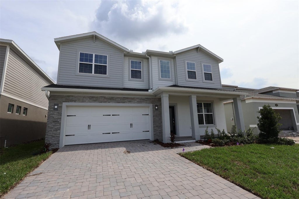 Photo of 6873 Yellow Warbler Bend, Saint Cloud, FL 34773 (MLS # O6450872)