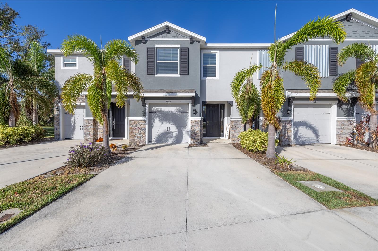 Welcome to easy Florida living in the gated community of Promenade at Palmer Ranch. This light and bright 3-bedroom, 2.5-bath townhome is ready for immediate occupancy and offers a fresh, clean feel with brand new carpet throughout. The open-concept floor plan is designed for modern living, with a spacious kitchen featuring white cabinetry, granite countertops, stainless steel appliances, a pantry, and a island that overlooks the dining and living areas.
Step outside to your private, screened-in lanai — the perfect spot for morning coffee, reading, or enjoying the Florida breeze. Upstairs, the primary suite provides a quiet retreat with a walk-in closet and a beautifully appointed en-suite bathroom with dual sinks and a walk-in shower. Two additional bedrooms and a full bathroom offer flexibility for guests, family, or a home office. The upstairs laundry room adds convenience to everyday life.
Promenade at Palmer Ranch offers residents a resort-style pool and secure gated access. Located just minutes to shopping, dining, Legacy Trail, top-rated schools, and Siesta Key’s world-famous beaches, this townhome offers the best of Sarasota at your doorstep.