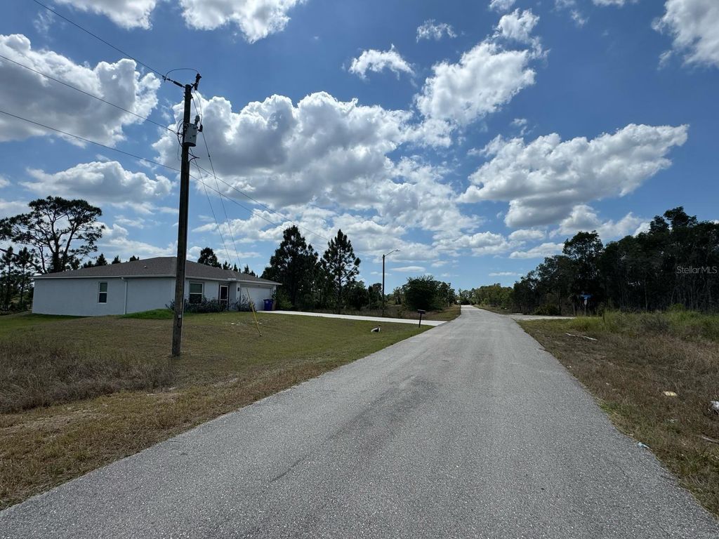 Photo of 942 Ardmore Street, Lehigh Acres, FL 33974 (MLS # O6304351)