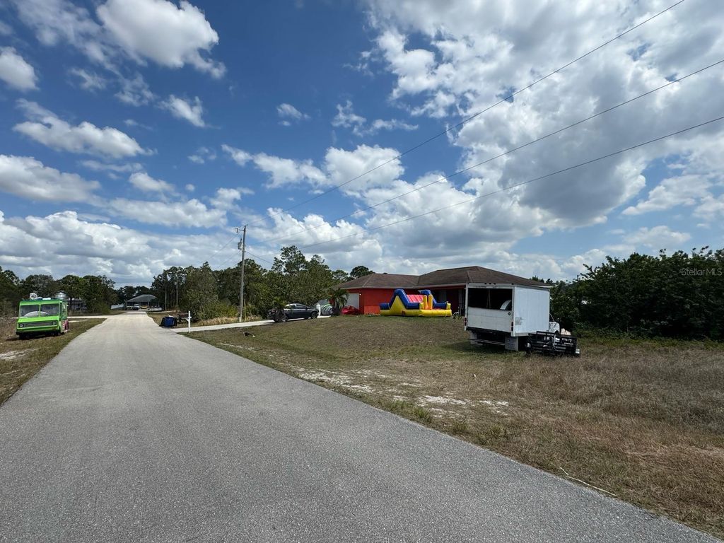 Photo of 942 Ardmore Street, Lehigh Acres, FL 33974 (MLS # O6304351)