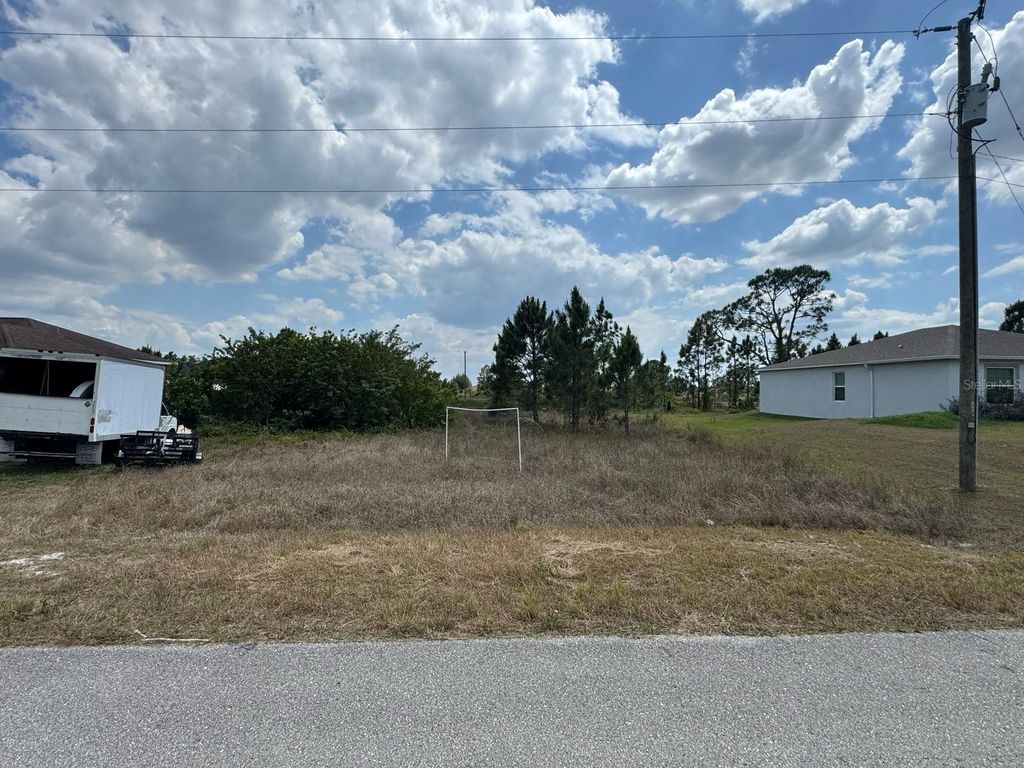 Photo of 942 Ardmore Street, Lehigh Acres, FL 33974 (MLS # O6304351)