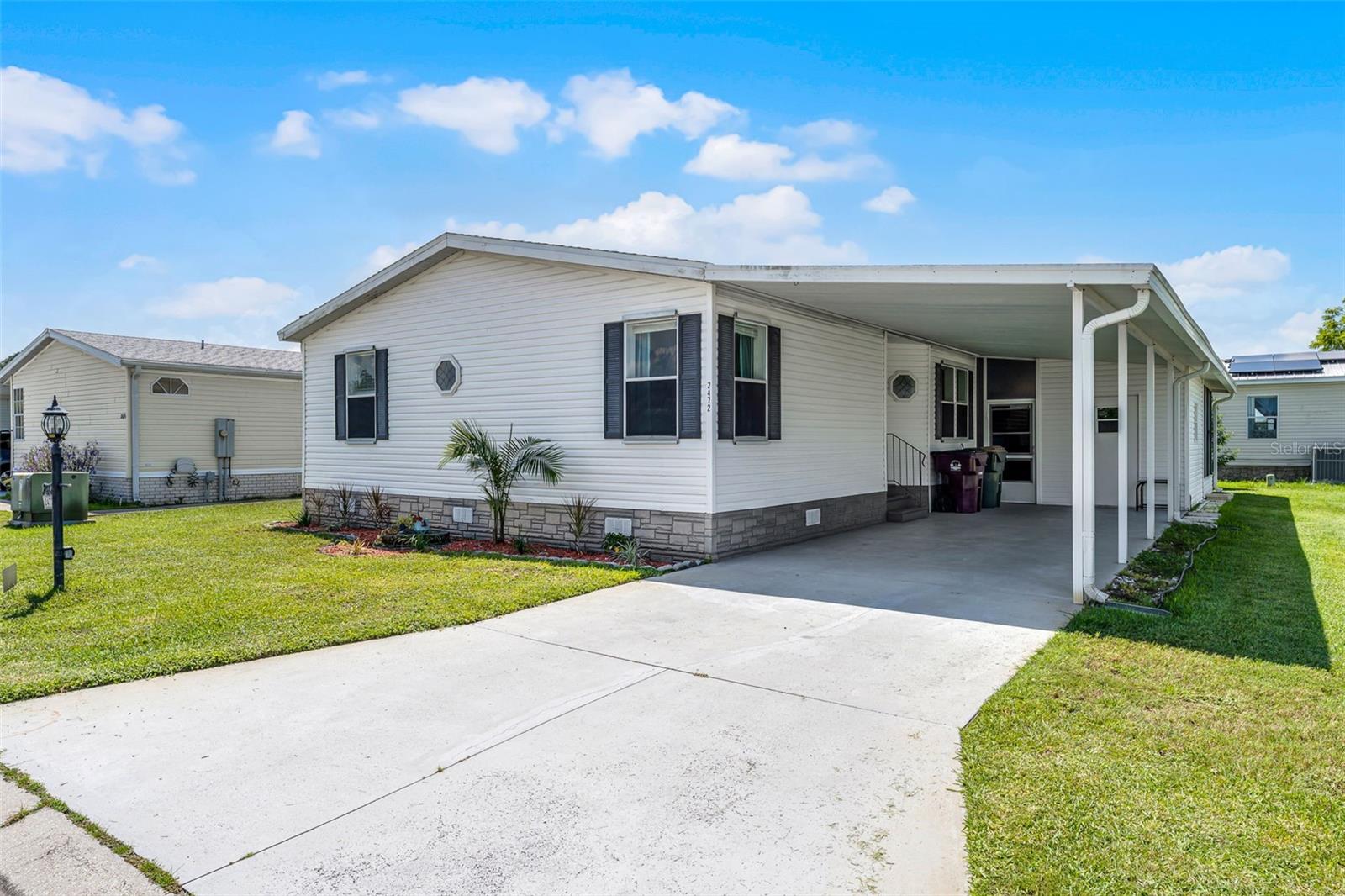 Discover the perfect blend of comfort and community at 2472 Independence Lane in the highly sought-after 55+ gated neighborhood of Teka Village. This beautifully cared-for 3-bedroom, 2-bath home is move-in ready with major updates including a new roof (Dec. 2024), water heater (2022), and a sprinkler system to keep your yard looking great with ease.
Inside, you’ll find a bright and open layout with spacious bedrooms, a well-appointed kitchen with ample cabinetry, and a relaxing primary suite featuring a walk-in shower and walk-in closet. Enjoy Florida living year-round with an enclosed patio, covered carport, and an attached shed perfect for storage.
Living in Teka Village means more than just a home: it’s a lifestyle. Residents enjoy an active clubhouse, heated indoor pool, fitness center, and a full calendar of social activities. The community’s gated entry, quiet streets, and low HOA fees make it a welcoming and affordable place to call home. Conveniently located near shopping, dining, and major highways, this home offers everything you need for relaxed and connected living.
Come see why Teka Village is one of St. Cloud’s most inviting 55+ communities!