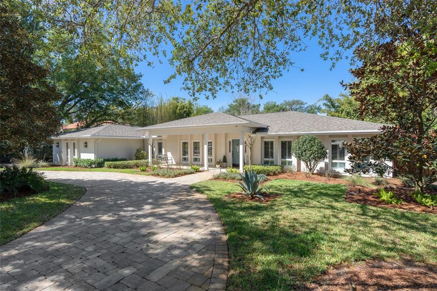 This modern traditional one-story pool home is located in one of Winter Park’s finest neighborhoods, Sevilla. Situated on over ¾ of an acre on the creek of Mead Gardens with no rear neighbors.  This special home features 4 bedrooms plus a den/office or nursery, boasting over 3600 square feet of living space. Lovely front porch, once inside one is greeted by a flood of natural light illuminating the large living and dining rooms. There are  2 primary bedrooms and spacious secondary bedrooms. The gourmet kitchen is a chef’s delight, appointed with custom wood cabinets providing an abundance of storage, ample counter and workspace, stainless steel appliances, granite countertops, an island, a workstation with a desk, and an eat-in area.  Seamlessly connected to the kitchen is an oversized family room with vaulted beamed ceilings, fireplace and French doors to an outside oasis! The large covered lanai is perfect for entertaining, features an outdoor kitchen equipped with an Alfresco grill with side burner, refrigerator, sink, bar overlooking the large sparkling pool with a sun shelf, outdoor lighting, travertine and an expansive, private rear yard. 

The owner's retreat is a haven of tranquility with direct access to pool and a private terrace.  Enjoy high ceilings and lots of natural light.  It includes an attached den that could serve many uses. The spa-like bath is equipped with his-and-her baths, a soaking tub, a walk-in shower, and two walk-in closets.

The exterior has been meticulously maintained with a newer roof, exterior paint (2018), pavered circular drive, a well and lush tropical landscape enhance the curb appeal.

The home also features a three-car side entry garage, a super laundry room which offers plenty of additional storage, pool heater, designer light fixtures and colors throughout, engineered hardwood floors and crown molding. Situated within the sought-after Winter Park School District, with Audubon K-8 and Winter Park High School.  Located just a short drive to Winter Park’s famed Park Avenue of shops, galleries and cafe's, Central Park, Rollins College, SunRail, the Farmer’s Market, and more. Call today for your private viewing of this pristine, well loved Sevilla home.