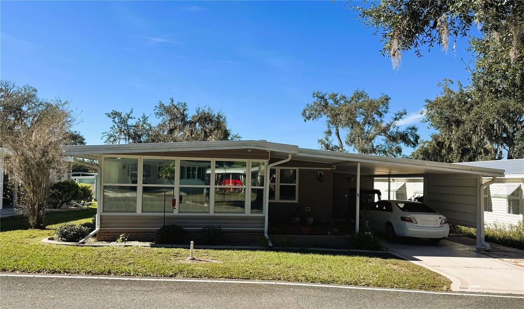 Photo of 105 Orchid Way, Leesburg, FL 34748 (MLS # R4910237)