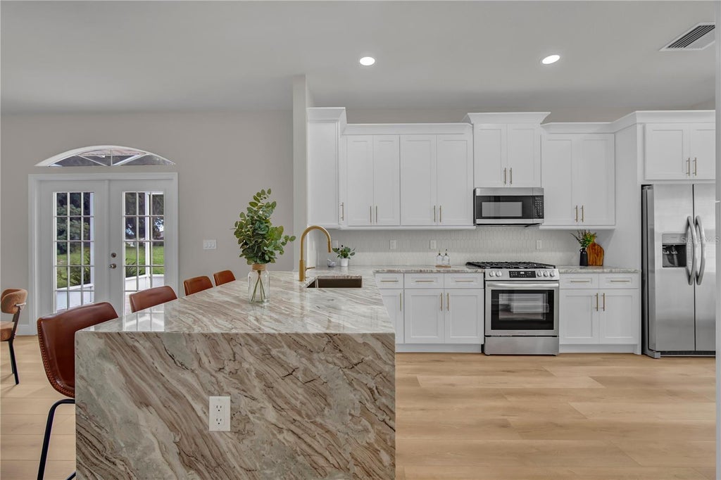 Photo of 5619 Prince Andrew Court, Leesburg, FL 34748 (MLS # G5115728)