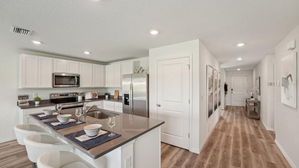 Photo of 15874 SE 101st Circle, Summerfield, FL 34491 (MLS # OM711158)