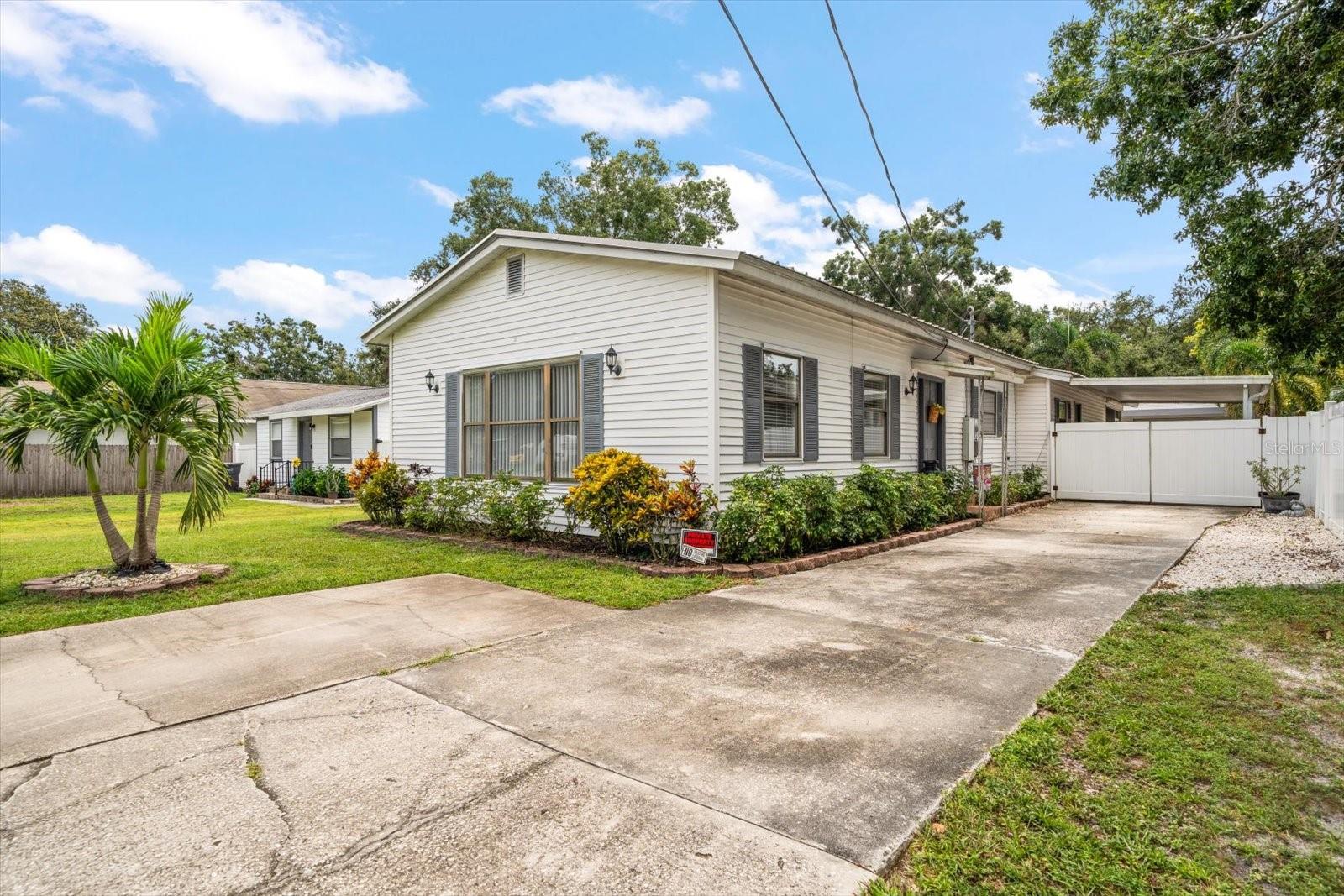 This beautiful home can be combined with MLS # TB8424591 to create a true family compound consisting of .85 acres. 3290 70th brings you 3 bedrooms, 2 baths, and 1,770 sq. ft. of updated living space on a third of an acre in Pinellas. The lot alone sets it apart with room to spread out, room for the kids or grandkids to run, or space to finally put in that pool you’ve talked about. And because it’s not in a flood zone, you don’t have the headaches or extra costs that so many St. Pete homes carry.
Inside, the updates are already done with durable vinyl plank floors throughout that look sharp and are easy to clean, a bright, updated kitchen that works as well for weeknight dinners as it does for Sunday gatherings, and plenty of natural light to make it all feel welcoming.
Step out back and this large property truly become special. The open space is a real change of pace for Pinellas County and the garage is just something else. With nearly 1,400 sq/ft, a full workshop and an air-conditioned studio/office, this is perfect for a business owner, contractor, mechanic, or anyone who needs space to build, fix, or create. It’s not just a garage, but a space where you can work on your business, hobbies, and/or your next big idea without tripping over cars in the driveway.
The expansive yard gives you the freedom to have large family barbecues or just a quiet evening under the stars. And you’re still close to downtown St. Pete, Tampa, and the Gulf beaches.
This home isn’t about flash. It’s about function, space, peace of mind and most of all Family. It’s the kind of place that just feels like home.