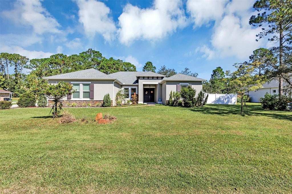 Photo of 340 Ruth Jennings Drive, Debary, FL 32713 (MLS # V4950077)