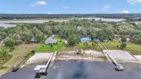 Photo of 141 E Cowpen Lake Point Road, Hawthorne, FL 32640 (MLS # OM710839)