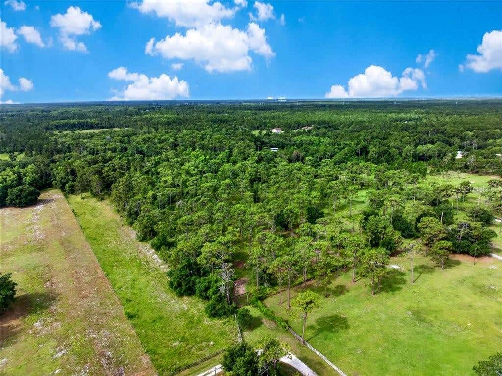Photo of 4600 Saddle Creek Run, New Smyrna Beach, FL 32168 (MLS # V4949588)