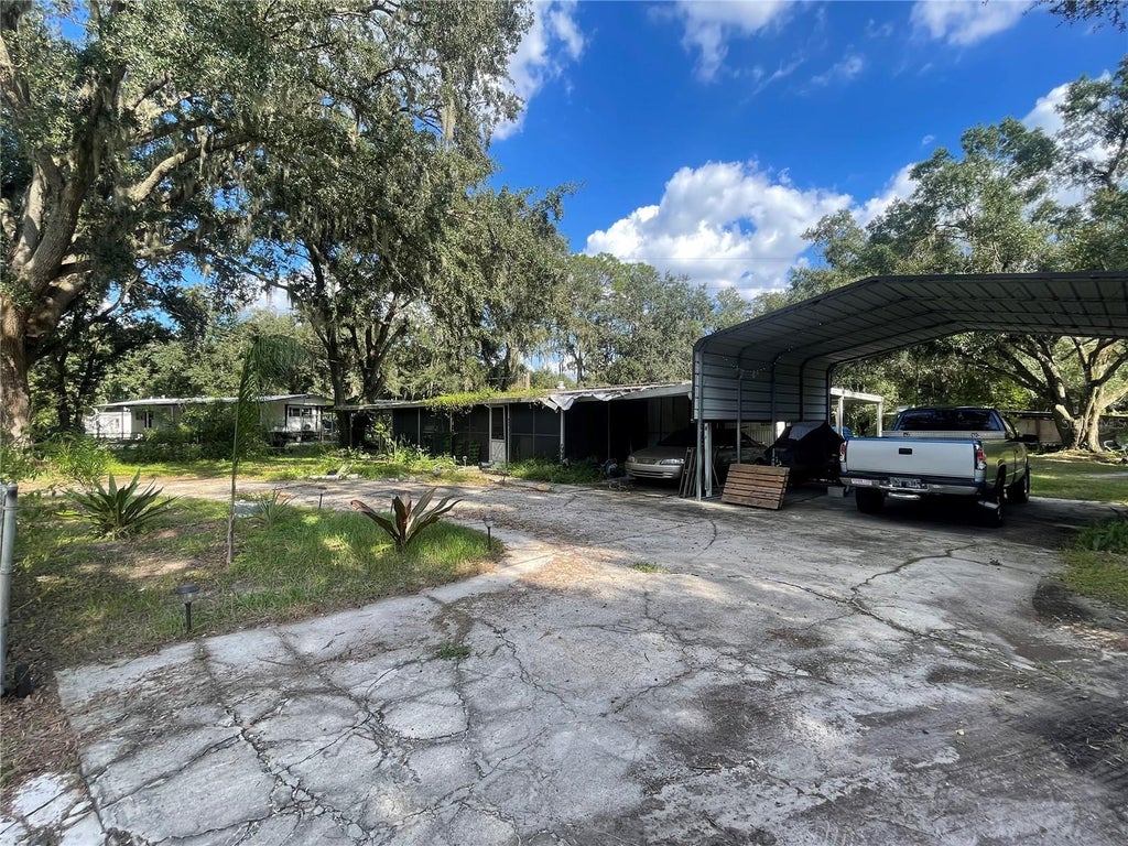 Photo of 840 Nashville Road, Lakeland, FL 33815 (MLS # P4940272)