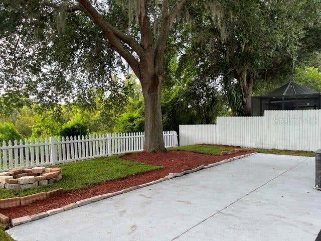 Photo of 10036 Perthshire Circle, Land O Lakes, FL 34638 (MLS # TB8532868)