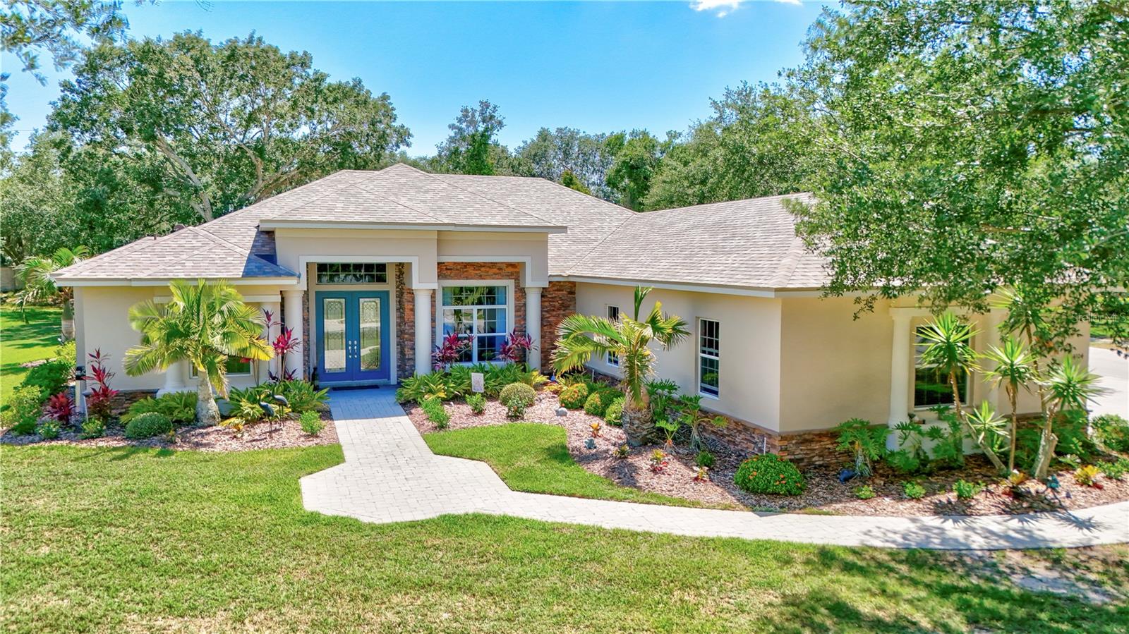 BRING Your toys, Cars, BOAT and RV! Plenty of room with an OVERSIZED 3 car attached garage and a MASSIVE detatched 2 car garage! Spacious Mill Creek Retreat with Dual Garages, Pool & Chef’s Kitchen
Almost 3/4 of an acre in a cul-de-sac in the highly desirable Mill Creek community, this beautifully maintained 4-bedroom, 3-bathroom home offers the perfect blend of functionality and space—inside and out.
Enjoy the flexibility of an oversized three-car ATTACHED garage plus an oversized two-car DETACHED garage ( Two Driveways) —ideal for your hobbies, workshop, boat, or extra storage. The sparkling pool is the centerpiece of the backyard and can be enjoyed from the comfort of the eat-in kitchen framed by an aquarium glass window. The chef’s kitchen features a large island, double ovens, a wine cooler, a walk-in pantry and additional closet pantry—perfect for entertaining or everyday living.
The home’s thoughtful split-bedroom design includes a spacious primary suite with double walk-in closets with custom closet system and private bath. Additional highlights include fresh interior paint, a formal dining room, large laundry room, and an open layout filled with natural light. And with a brand new roof (2025), peace of mind comes standard.
Low HOA, no CDD fees, and a serene location make this Mill Creek gem a rare find.