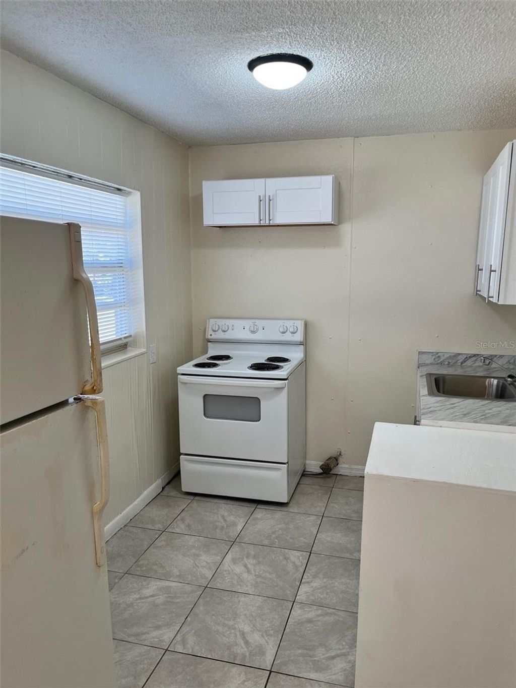 Photo of 1341 Winnifred Street, Orlando, FL 32805 (MLS # O6381539)