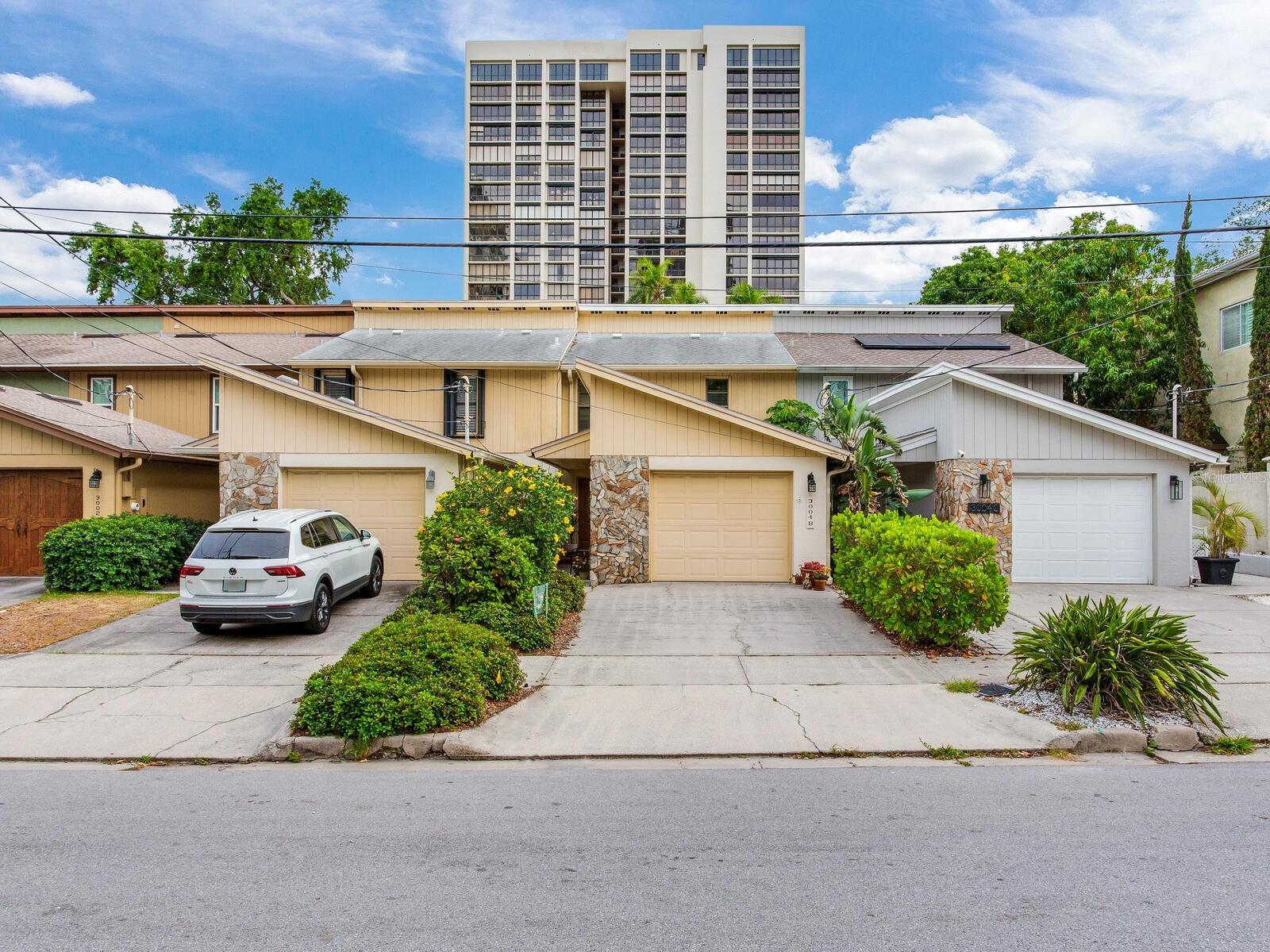 Live the South Tampa Dream — Just Off Bayshore, with No HOA! Welcome to 3004 W Mason Street, Unit B, a beautifully maintained two-story townhome located in the highly desirable Crest View subdivision. Featuring 2 bedrooms, 2.5 bathrooms, and 1,760 square feet of heated living space (2,171 SF total), this residence combines charm, functionality, and an exceptional location—all with no HOA fees.
Just steps from the iconic Bayshore Boulevard, this private retreat allows you to fully embrace the vibrant South Tampa lifestyle in both comfort and style. Inside, rich wood flooring spans the entire first floor, creating a warm, inviting ambiance throughout. You’re welcomed by a small entry foyer that flows into a spacious front living area, which may also serve as a formal dining room. Beyond that, the home opens into a family room and kitchen combination—a great space for everyday living and entertaining. (Ask to see the floor plan!) The kitchen is thoughtfully designed with ample cabinetry and an oversized eating bar, ideal for casual meals or hosting guests. From the family room, step out onto your own private oasis: a generous 400-square-foot deck surrounded by lush greenery, perfect for morning coffee, evening wine, or weekend get-togethers. The home also includes a finished 315-square-foot garage, offering secure parking and additional storage.
Upstairs, the second level features a spacious primary suite along with a well-appointed guest suite, offering privacy and comfort for both homeowners and visitors. Originally built in 1979 and updated with an effective year built of 2001, the home sits on a 2,425-square-foot lot and is zoned RM-35. Whether you're looking for a stylish personal residence or a smart, low-maintenance investment, this townhome checks every box—modern convenience, walkability, and timeless appeal in one of Tampa’s most desirable neighborhoods. An Unbeatable Location: Just half a block from Bayshore Boulevard’s scenic waterfront; Walking distance to top-rated restaurants, cafes, and boutique shops; Located in the highly coveted Plant High School District (A-rated); Minutes to Hyde Park Village, Downtown Tampa, Riverwalk, and Water Street. Your Slice of South Tampa Awaits! Don’t miss this rare opportunity to own in one of the most sought-after neighborhoods in Tampa. Schedule your private tour today and experience South Tampa living at its finest