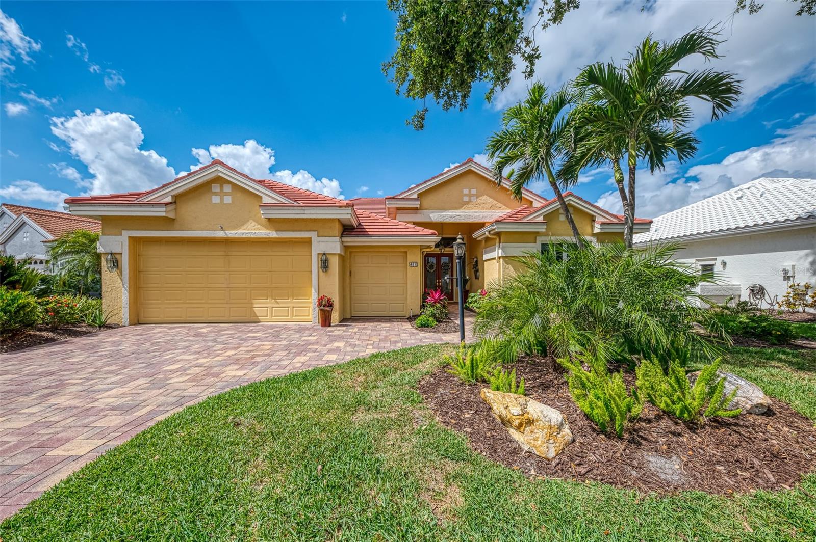 Rarely available, this updated home in a maintained neighborhood has 3 bedrooms, 3 baths,
pool, spa, and PHENOMENAL south-facing water view. The floor plan is perfect for entertaining
family and friends with its centrally located kitchen or if you choose a quiet evening viewing the
wildlife at VGCC and soak in the uninterrupted water view on the raised platform of the spa. The
entire home is bathed in natural light throughout the day accentuating the beautiful architecture
and crown molding shows off the phenomenal 12 FOOT CEILINGS making this home feel spacious and luxurious. THIS HOME OFFERS AN IMMEDIATE OPPORTUNITY FOR A GOLF
MEMBERSHIP. The Primary bedroom and bath will spoil the homeowner w/blackout shades,
privacy sheers, built-in cherry bookshelves and cabinets with a desk area and marble countertop.
The primary bathroom includes matching cherry cabinets, a newly tiled walk-in shower with a bench,
overhead and handheld shower, dressing table and double sinks. CUSTOM WALK-IN CLOSET
WILL WOW EVEN THE PICKIEST! The centrally located kitchen was redesigned with a view of
the living room, has stainless steel appliances, a breakfast bar, hardwood cabinets with pantry,
spice drawer, fan/light over stove, roll down corner cupboard, soft close drawers and doors, two
sinks, under-counter lights (3-25), granite countertops and push button garbage disposal. A cooks
delight! Both guest bedrooms have their own UPDATED guest baths for privacy. One guest
bath could be used as a pool bath and is accessible from the same side of home as the lanai.
Many windows have been replaced to code. The roof was replaced in 2013 and has been
inspected every year.. The pool cage was replaced w/spa addition in 2011. HVAC was
replaced in 2019 (is under a 2 visits/year service contract) and garage door in 2021, pool pump
in 4/2025 and electric panel in 4/2025. VGCC is a member-owned PRIVATE COUNTRY CLUB
WITH 589 homes. Membership IS MANDATORY. Meet and make new friends for dining or
after golf in the renovated clubhouse that offers both casual and formal dining. There is a
casual bar for meeting with friends or an exclusive bar for higher-end wines and bourbon. On
cooler evenings, gather around the fire pit with friends, enjoying the views across water to the
18th green. Work out in the newly enlarged Wellness Center with state-of-the-art equipment
and on-site physical therapist, massage therapist, personal trainers and a wide variety of fitness
classes. The club has a unique ”U” program that offers cultural and learning events and there is
mahjong, bridge, bocce, book club, wine club, in addition to golf, tennis and pickleball leagues..
With easy access from I-75, and centrally located between Tampa/Sarasota and Punta Gorda/
Ft. Myers airports, this mature community is only 5 miles from charming downtown Venice and
20 miles from culturally-rich Sarasota. Venice Golf and Country Club is an award-winning
Certified Audubon Geo Cooperative Sanctuary with 26 lakes/ponds and 13 natural preserves.
VGCC is truly a unique community in Southwest Florida, as illustrated by the number of
members who have made it their year-round home. This is a must-see property. Click on the
link for more photos and information:
https://portfolio.precision360 photography.com/property/410-wellington-ct