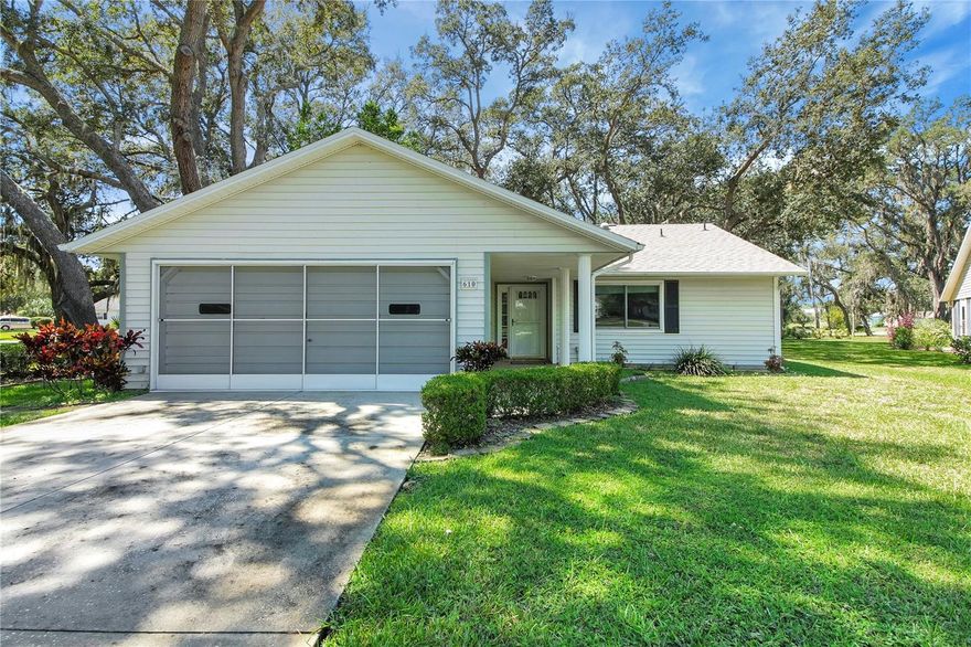 NEW IMPROVED PRICE  -SCOTTISH HIGHLANDS HARD TO FIND WITH 2 CAR GARAGE (Only one in SH with 2 car garage actively listed) ON BEAUTIFUL TREED LOT – WELL FOR IRRIGATION – NEWER ROOF IN 2022 –NEWER DOUBLE PANE WINDOWS – SCREENED GARAGE DOOR – NO CARPET ---  FURNITURE STAYS (not tv’s)  -  Long driveway on cul-de-sac.  Front covered porch with tiled flooring 19x6.   Open floorplan with large living room with cathedral ceilings opening up to kitchen and dining room.  Kitchen has breakfast bar, gas stove, closet pantry and loads of cabinetry.  Primary bedroom has two closets, laminate flooring, ceiling fan. Primary bath has walk-in shower,  toilet and tiled floors.  Guest bedroom in front of home has 6x6 walk-in closet. Guest bath has tile floors with walk-in tub.  Florida room has glass windows and tiled floors.  Garage is 21x19 with pegboard, pull down stairs, utility tub, side service entry and screened garage doors.  Solar tubes in living room and guest bathroom.   Gutters.   Lovely lot located on a cul-de-sac with nice backyard with beautiful trees.   Make  this move in condition home your next address and live in a great community which offers loads of activities to choose from.  Indoor Olympic pool, spa, outdoor pool, recreation buildings, tennis, pickleball, bocci ball.  Storage for your rv/boat available for extra fee.  Great convenient location close to shopping, restaurants, medical and worship facilities   Make appointment today to view!