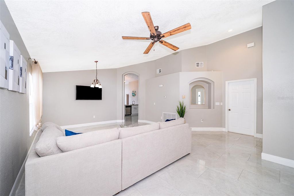 Photo of 207 Langham Drive, Davenport, FL 33897 (MLS # O6370027)