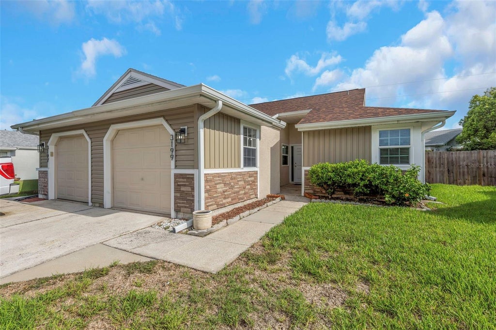 Photo of 3199 Phlox Drive #214, Palm Harbor, FL 34684 (MLS # W7888314)