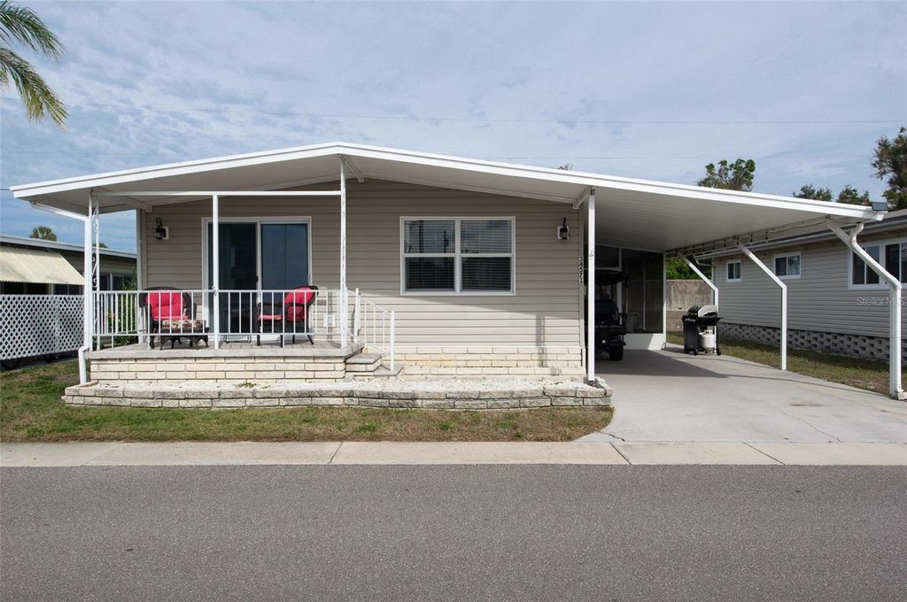 Photo of 34571 Gardenia Drive N, Pinellas Park, FL 33781 (MLS # TB8466076)