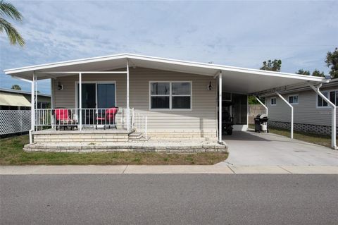 Photo of 34571 Gardenia Drive N, Pinellas Park, FL 33781 (MLS # TB8466076)