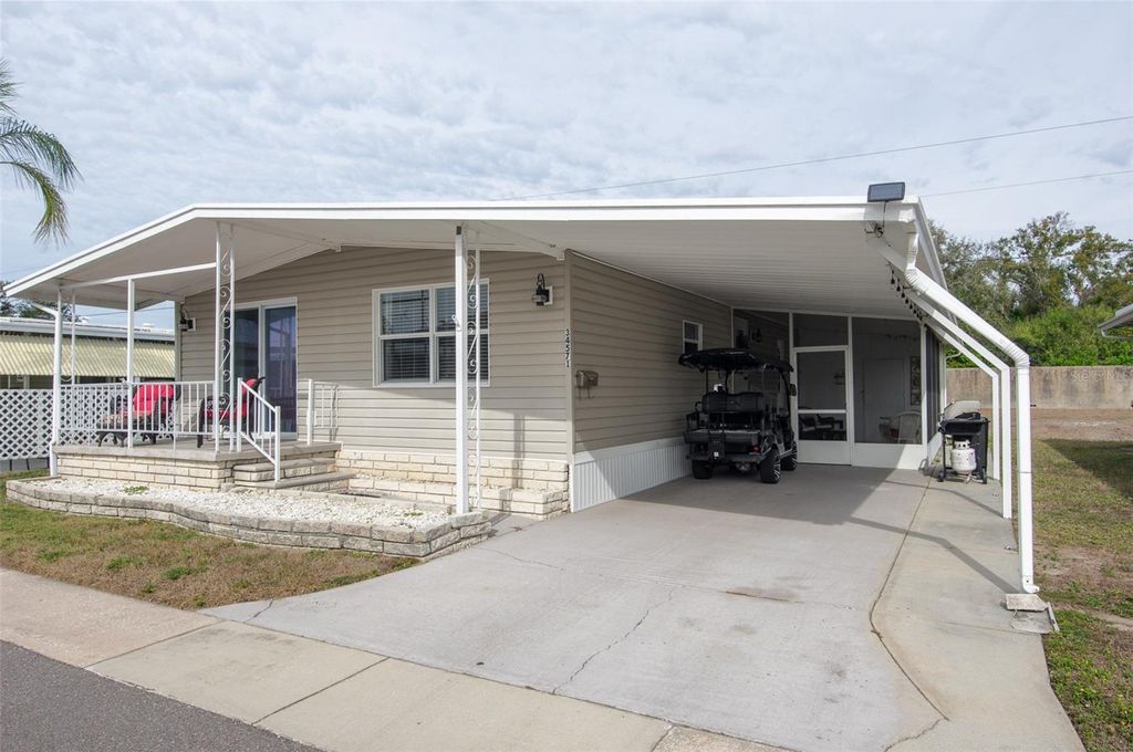 Photo of 34571 Gardenia Drive N, Pinellas Park, FL 33781 (MLS # TB8466076)