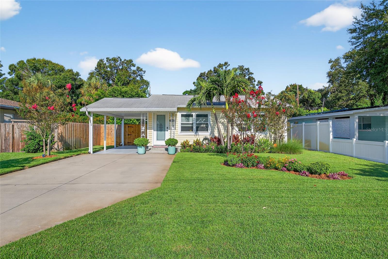 Welcome to your private Gulfport oasis! This immaculately maintained and fully updated 3-bedroom, 2-bathroom pool home offers the perfect blend of style and comfort. Updates include new impact windows and doors installed in 2024, a 2015 A/C, 2016 roof, 2019 water heater and a high end saltwater pool installed in 2023. Just 1.5 miles from vibrant Downtown Gulfport, minutes from the beaches, and a quick drive to Downtown St. Pete. From the moment you arrive, you'll notice the lush landscaping and carport that reflect the well-cared-for, welcoming home. Inside, the bright and open split floor plan features a spacious living room and dining room combo. The beautifully updated kitchen shines with quartz countertops, stainless steel appliances, a gas range powered by an exterior propane tank, and abundant cabinetry for storage. The separated primary suite includes direct access to the backyard, an enormous walk-in closet, and an attached bathroom with glass-enclosed step-in shower. Two additional bedrooms are nicely sized and share a full bathroom. The new washer and dryer set will stay with the home, offering added convenience. Step outside into your backyard paradise, complete with the saltwater pool - equipped with a heater and chiller for year-round enjoyment. Lounge on the paver deck, dine under the covered patio, rinse off in the outdoor shower, and take in the tranquil landscaping that includes dombeya, climbing oleander, dwarf Cavendish banana, sweet almond bush, and more. The fenced yard also features a shed, well-fed irrigation system, and space to garden or simply relax under the Florida sun. The home is located just one block from Boca Ciega High School, two miles from St. Pete Beach, and is NOT in a flood zone. Whether you're looking for a primary residence or seasonal home, this super clean, move-in-ready property delivers Florida living at its finest.