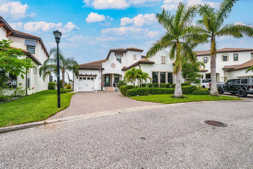 PRICE REDUCTION! 133 feet of waterfront luxury! One of the largest lots in South Shore Yacht Club! Please make sure to ask about the pool! Most of the materials to complete the pool are on site! Please inquire with the listing agent for details. 16,000 pound boat lift and additional mooring available with extra pilings and a 65' x 4' additional floating dock! Coastal Elegance Meets Boater's Paradise! This exceptional 3-bedroom, 2.5-bath residence is perfectly situated on an oversized lot along a deep saltwater canal, offering direct access to Tampa Bay and the Gulf of Mexico—ideal for boating enthusiasts. This is a Pompano model and has a private elevator and 3 car garage. Enjoy the convenience of a private dock equipped with a 16,000 lb boat lift, plus electric and water hookups, making it easy to be on open water within minutes. This home seamlessly blends sophisticated design with coastal charm, featuring a spacious open floor plan, a dedicated home office, and a 3-car garage. The gourmet kitchen is a chef’s delight, boasting a large quartz island with built-in sink, top-of-the-line appliances including a wall-mounted convection oven, cooktop, microwave/oven combo, and a modern range hood—all designed for both style and performance. Step outside into your private outdoor oasis. The lanai with a fully equipped outdoor kitchen is perfect for year-round entertaining or peaceful evenings at home.  As a resident of South Shore Yacht Club, you’ll enjoy availability to a full-service marina with wet slips, dry storage, and a tackle shop. Resort-style amenities abound, including waterfront dining, a sparkling community pool, state-of-the-art fitness center, clubhouse, pickleball courts, and a dog park for your furry companions. Just a short ride by boat across scenic Tampa Bay to the open waters of the Gulf of Mexico—home to some of Southwest Florida’s premier fishing spots. Nestled in a vibrant and welcoming waterfront community, this property offers an unmatched array of amenities, including a Clubhouse, resort-style pool, state-of-the-art fitness center, golf cart and walking paths, pickleball courts, two waterfront restaurants (Sunset Grill and Hooks), two marinas, a private beach area, and 24-hour gated security with roving patrols.

Evenings here are filled with friendly golf cart rides and boat waves from neighbors—true coastal living at its finest. Keep your boat on your private lift or store it just steps away in the convenient high-and-dry marina. You're only a short drive from both Tampa and Sarasota, with year-round boating and fishing at your fingertips. Popular nearby boating destinations include Shell Key, Bunce’s Pass, Egmont Key, Passage Key, John’s Pass, Beer Can Island, and Apollo Beach. Dock-and-dine options abound, with easy boat access to a dozen local waterfront restaurants, including those in downtown Tampa and St. Petersburg.

Located in the exclusive Southshore Yacht Club / Little Harbor—one of Florida’s few luxury waterfront communities with direct Gulf access—this neighborhood boasts waterfront dining, a community beach, tennis, fitness, and more, all set against beautifully maintained, tropical landscaping. Discover the best of Florida waterfront living at Southshore Yacht Club!