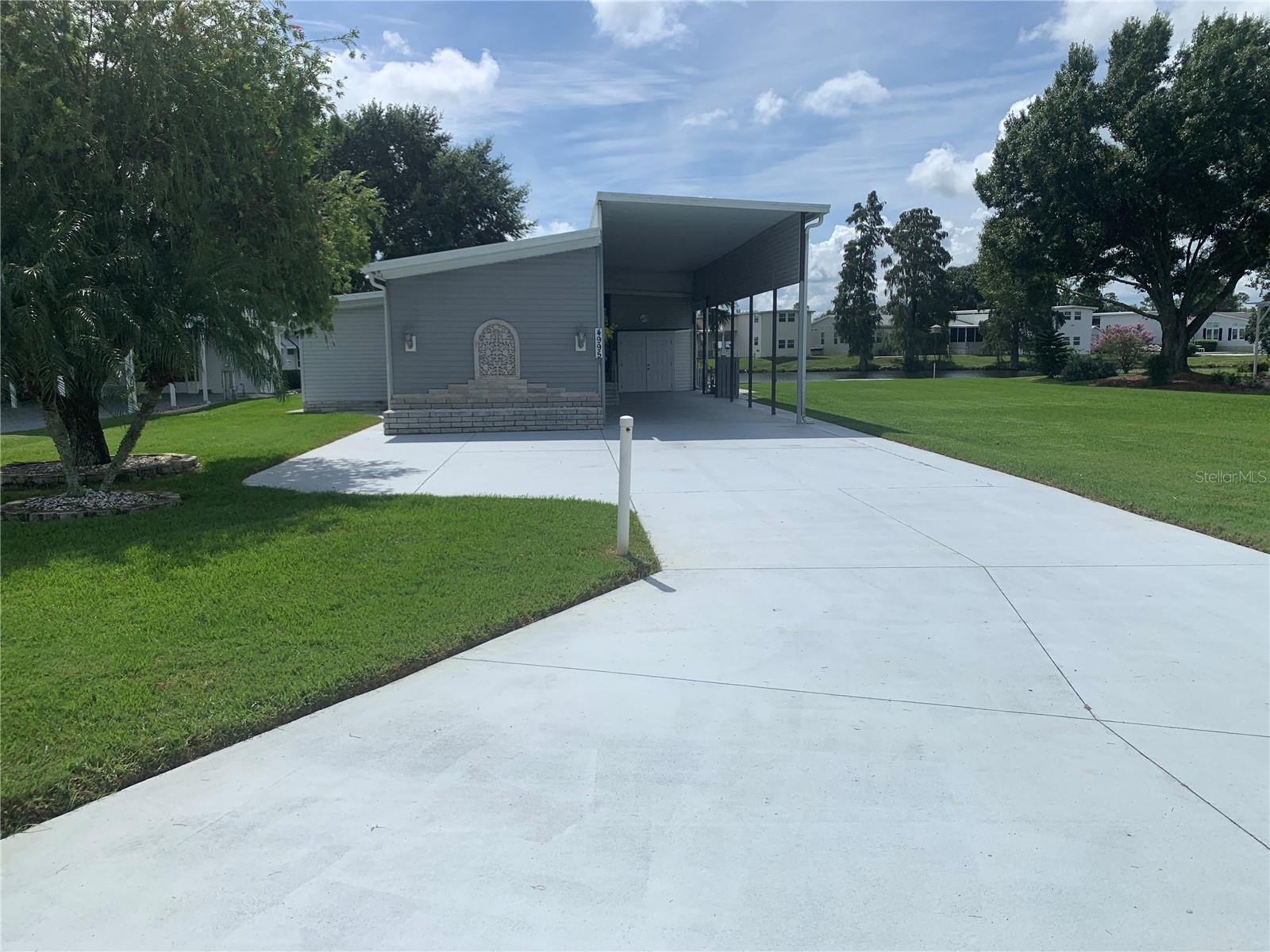 **Stunning Waterfront Class A RV Port Home – Fully Furnished & Ready for You!**
Experience the ultimate blend of comfort, luxury, and convenience in this exquisitely updated waterfront RV Port home in the highly desirable Mount Olive Shores community. This fully furnished gem is truly turn-key—step inside and start relishing the vibrant Florida lifestyle from day one!
Inside, you’ll find a bright and contemporary interior that showcases:
- A stunningly remodeled kitchen, complete with sleek cabinetry, granite countertops, and high-end updated appliances
- A newer A/C system and hot water heater, ensuring your comfort year-round
- Luxurious, updated bathrooms and new flooring throughout the kitchen, dining area, Florida room, and baths
- Energy-efficient dual-pane windows and an insulated metal pan roof designed to keep your utility bills low
- An expansive Florida room with breathtaking panoramic canal views, plus an additional concrete slab for outdoor relaxation and entertainment
The spacious RV Port is equipped with full utility hookups, making it ideal for your Class A motorhome.
Nestled within the welcoming, gated community of Mount Olive Shores, you’ll benefit from low HOA fees and a lifestyle perfectly suited for RV enthusiasts. Enjoy the convenience of being just 3.5 miles from I-4, providing quick access to shopping, dining, and world-class medical facilities, as well as the exciting attractions of both Tampa and Orlando—each less than an hour away.
This isn’t just a home; it’s a transformative lifestyle upgrade. In this deed-restricted community, Class A motorhome ownership is a requirement for the first year of accumulated residency, contributing to a vibrant, well-maintained neighborhood.
Seize the opportunity to live waterfront in one of Central Florida’s premier RV communities—schedule your private showing today and start living the dream!
