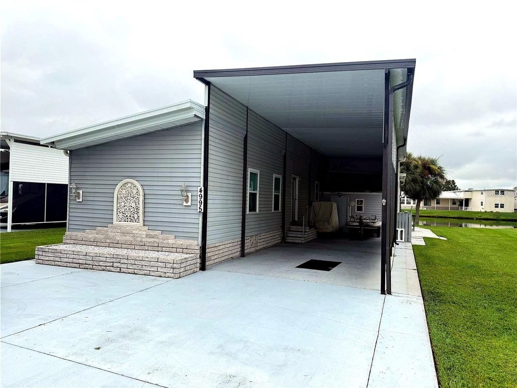 Photo of 4995 Mount Olive Shores Drive, Polk City, FL 33868 (MLS # P4936230)