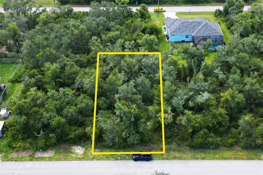 Beautiful secluded .23 Acre lot in quiet neighborhood bordering Tippecanoe Environmental Park and Charlotte Sports Park across from Westport in Port Charlotte.  Easy access to sports, dining, beaches and shopping.  Build your dream home here and give yourself what YOU want.