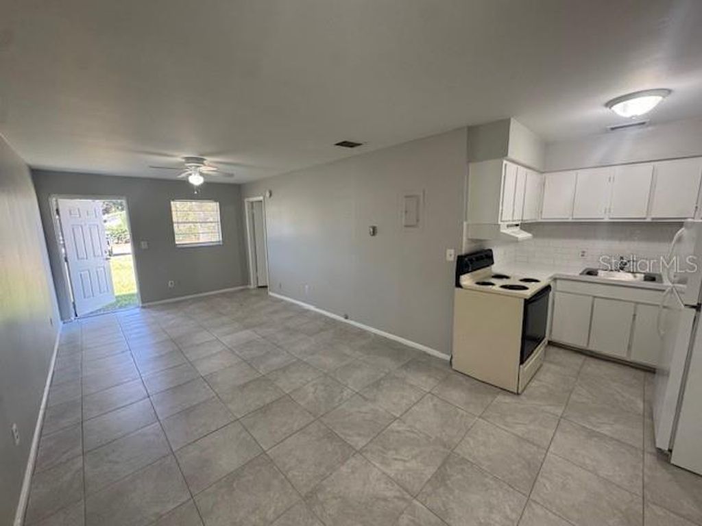 Photo of 12140 Munbury Drive #5, Dade City, FL 33525 (MLS # TB8449067)