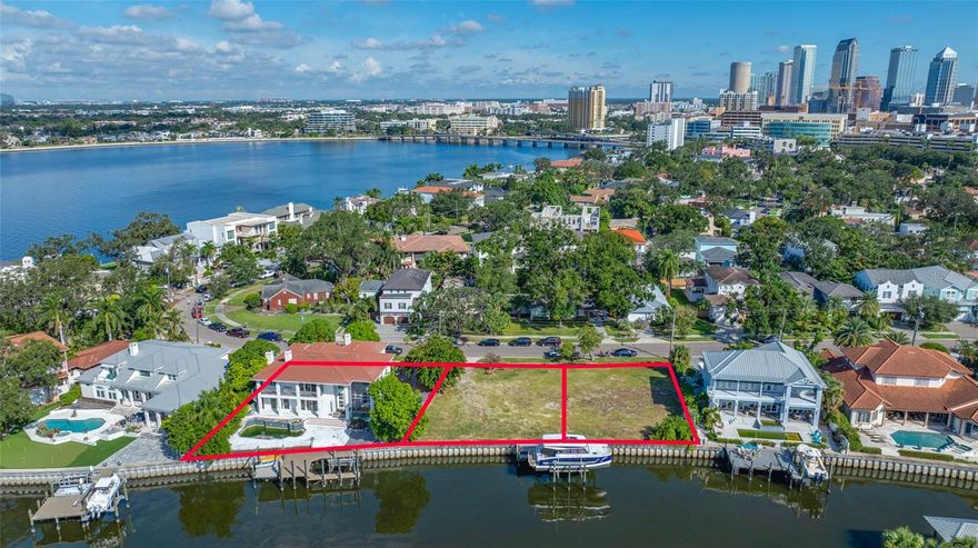 SAILBOAT WATER, NO BRIDGES homesite in one of the most desirable locations on Davis Islands. Walk to work at Tampa General Hospital or be downtown in just minutes. This homesite is located just a handful of homesites away from the open bay with no bridges in the way and some of the deepest and widest canal locations one will find on the islands. Bring your big sailboat or fishing boat with tuna tower ... both would fit just fine. Dimensions are approximately 75 x 108 so there's plenty of width and depth for your own urban waterfront oasis. In fact, your future new-build will even afford you fantastic downtown skyline views to the north to accompany your fantastic waterfront views to the south. 

Do you desire more land for your waterfront design plans? The adjacent homesite of near equal dimensions (104 Adalia) is also available for $3.5m. Having both will provide you a fully completed dock which straddles the two homesites and is equipped with a heavy-duty lift and full electric and water. 

Still need even more space? Why not add 96 Adalia to your shopping cart. This high and dry, partially upgraded residence, boasts approximately 4500 sf. of conditioned space and 6100 sf total under roof. Soaring ceilings and a 3 car garage set the tone for someone looking to wrap up the upgrading to their own tastes. The homesite, itself, is the star of the show. Boasting dimensions of 100 x 121 and a massive dock with boat lift as well as a platform lift for water toys, these features alone make the house a very nominal expense while being located on an extremely wide confluence of 2 separate canals ... making for easy maneuverability and privacy.

If one purchases all 3 properties, the seller will throw in his very lightly used 2021, 36’ power cat cruiser located on site! This provides for 250' of water frontage, 2 large docks, and a nearly completed home update.