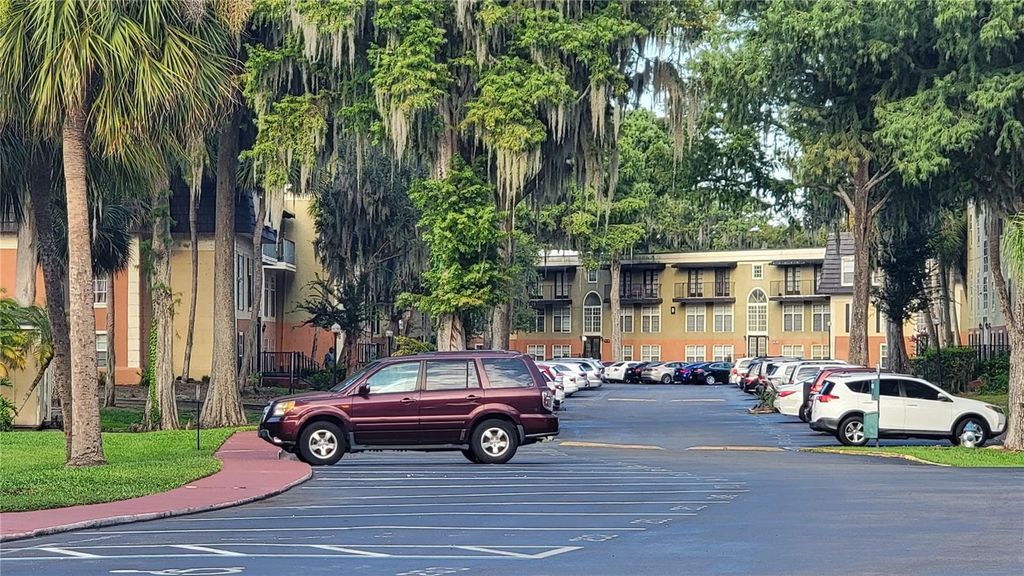 Photo of 4023 Versailles Drive #4023F, Orlando, FL 32808 (MLS # O6412800)