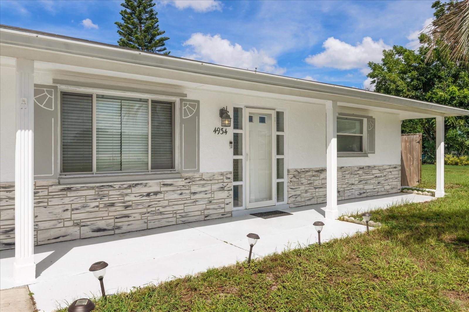 Welcome to 4934 Lemonwood Loop, a beautifully updated residence where thoughtful upgrades meet modern comfort. This home has been meticulously cared for with extensive renovations inside and out — offering true move-in readiness. The kitchen is a showstopper with granite countertops, stainless steel appliances (2022), new dishwasher (2025), soft-close cabinetry, and a new sink and garbage disposal. Step inside to find luxury vinyl plank flooring with padded cushion, all new baseboards, cedar-lined closets with new doors, and a freshly updated bathroom. The bathroom has been completely renovated with a new vanity, fixtures, reglazed tub, and updated plumbing. Every detail has been considered — from custom window treatments to new lighting, outlets, GFCIs, and fresh paint. For added convenience, a new washer and dryer (2025) convey with the sale. Outside, the home shines with fresh exterior paint (2024, 3 coats), a new 2-zone sprinkler system, hurricane shutters, plus a Hurricane Impact Rated Garage door. Major systems are in excellent shape with a roof (2014), HVAC (2014), hot water tank (2018), and updated electrical panel. Technology and lifestyle features elevate this property even further, including Ring doorbell + Ring Indoor Camera, Google Nest, Exterior Solar Security Cameras, and the unique bonus of all furniture, flat-screen TVs, and outdoor grill staying with the home. This is more than just a move-in ready house — it’s a fully updated home, blending style, convenience, and peace of mind. Call for an appointment to make it yours today!