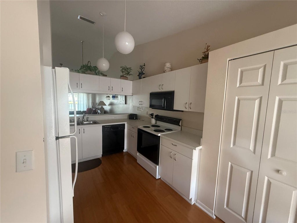 Photo of 4211 Caddie Drive E #202, Bradenton, FL 34203 (MLS # A4698649)