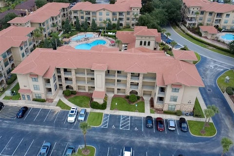 Photo of 912 Charo Parkway #233, Davenport, FL 33897 (MLS # S5152977)