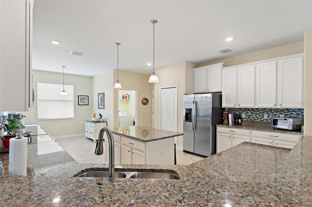 Photo of 1311 Gleneagles Lane, Davenport, FL 33896 (MLS # S5159578)