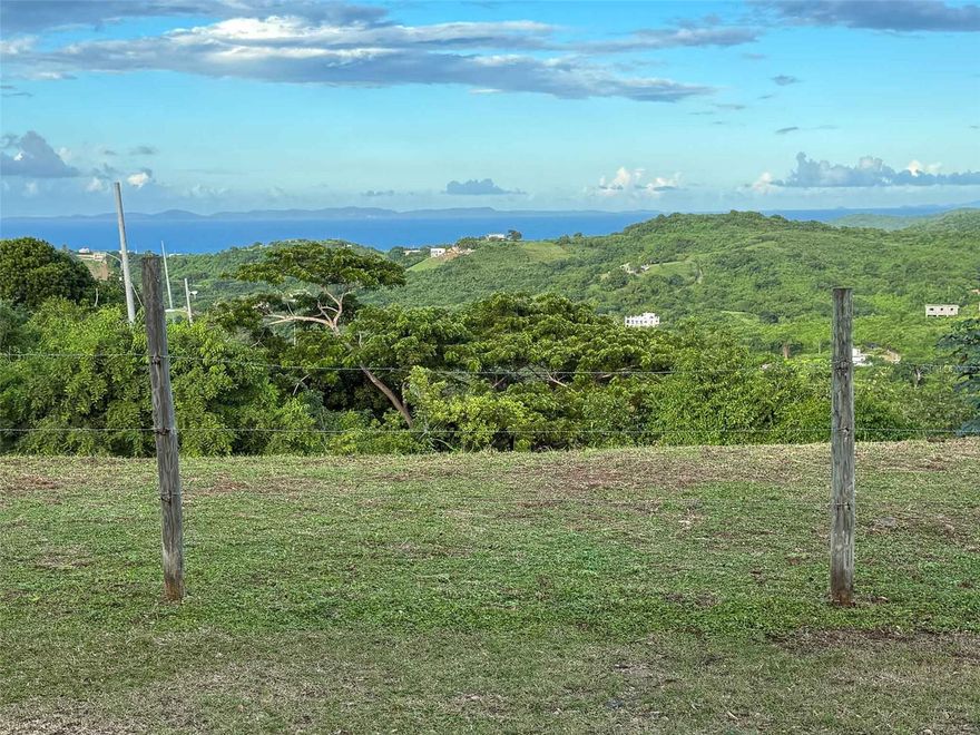 Located along the scenic ridgeline of Monte Carmelo, this approx. 1/4-acre corner parcel offers one of Vieques Island’s most compelling opportunities for those looking to build a custom home with panoramic views, trade winds, and creative freedom.

Set on a gentle slope with existing level cuts in the hillside, this parcel is naturally terraced—ideal for designing a multi-level residence or incorporating distinctive landscaping features. From the property’s elevated position, you’ll enjoy unobstructed northern views of the Caribbean Sea, the neighboring island of Culebra, and—depending on your design—potential coast-to-coast vistas including El Yunque and the southern shores of Vieques.

This is raw land with real potential. A prior wooden structure once stood on site, and remnants of a septic system remain—offering a head start for future construction. Utilities including water and electricity are located at the paved road bordering the lot, simplifying the development process.

31 Samuel Felix is located in a quiet, residential area known for its sense of community and creative spirit. Monte Carmelo is increasingly sought-after for its elevation, privacy, and long-term potential, all while remaining just minutes from Isabel Segunda, beaches, and the entrance to the Vieques Wildlife Refuge.

Buyers should note that this parcel is not currently titled, but could be available via Vivienda, a common and legally recognized process on the island used by many long-time residents.

Whether you’re envisioning a dream home, eco-retreat, or Caribbean getaway, this lot delivers a rare blend of accessibility, natural beauty, and open-ended potential.

Property Highlights:

Approx. 1/4 acre corner lot in Monte Carmelo

Elevated ridgeline with wide ocean views

Northern vistas of the Caribbean Sea, Culebra, and El Yunque

Potential for panoramic south-to-north views with right design

Sloped parcel with natural terraces for construction

Access to paved road, electric, and water at the lot line

Remnants of septic system on site

Close to Isabel Segunda, beaches, and nature reserves

Whether you're an architect, investor, or future homeowner with a vision, 31 Samuel Felix offers the canvas to bring your ideas to life. Few Vieques properties combine views, infrastructure access, and affordability like this one.