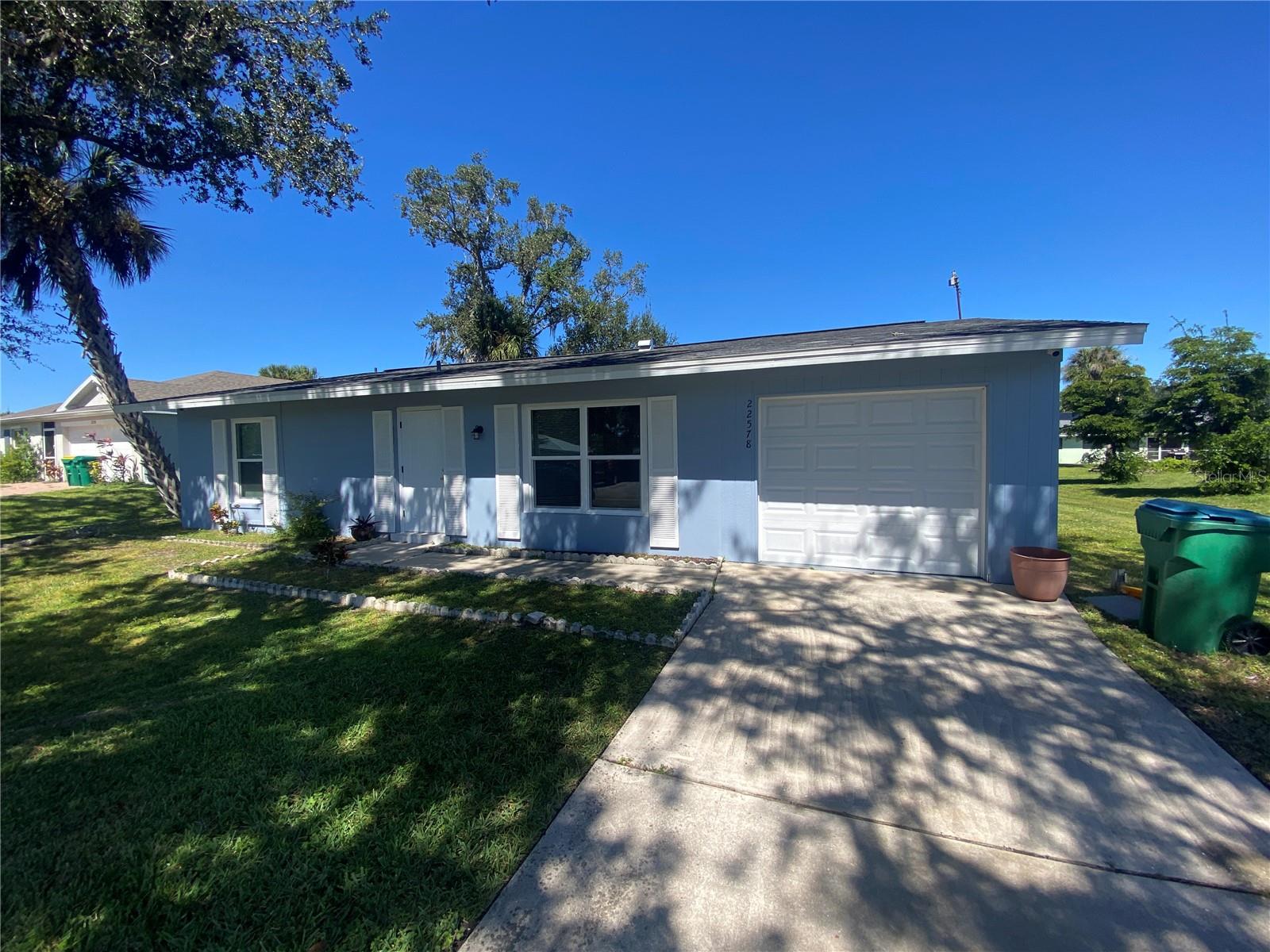Welcome to this beautifully maintained 2-bedroom, 2-bathroom home nestled in the vibrant community of Port Charlotte, FL. Step inside to discover a freshly painted interior, offering a bright, clean, and modern feel throughout.
The galley-style kitchen is perfect for cooking enthusiasts, featuring an efficient layout that makes meal prep a breeze. A spacious sunroom invites one to relax and soak in the Florida sunshine year-round.
Enjoy the large backyard, ideal for outdoor gatherings, gardening, or simply unwinding in your own private space. Additional features include a 1-car garage, ceiling fans, and window blinds for everyday comfort and convenience.
Located close to shopping, dining, and local amenities, this home offers the perfect blend of comfort, style, and practicality.
