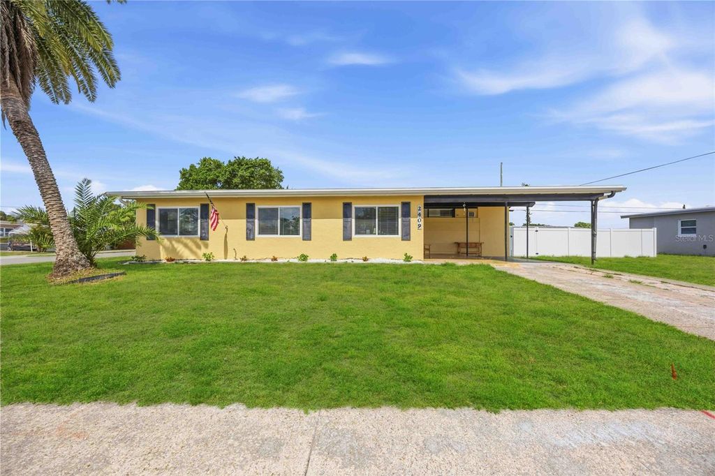 Photo of 2409 Ednor Street, Port Charlotte, FL 33952 (MLS # C7525966)