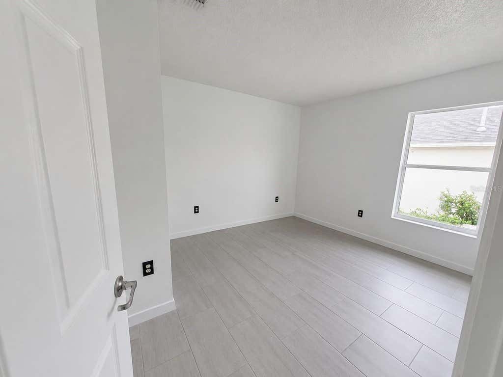 Photo of 449 Heather Hill Boulevard, Davenport, FL 33837 (MLS # O6433329)