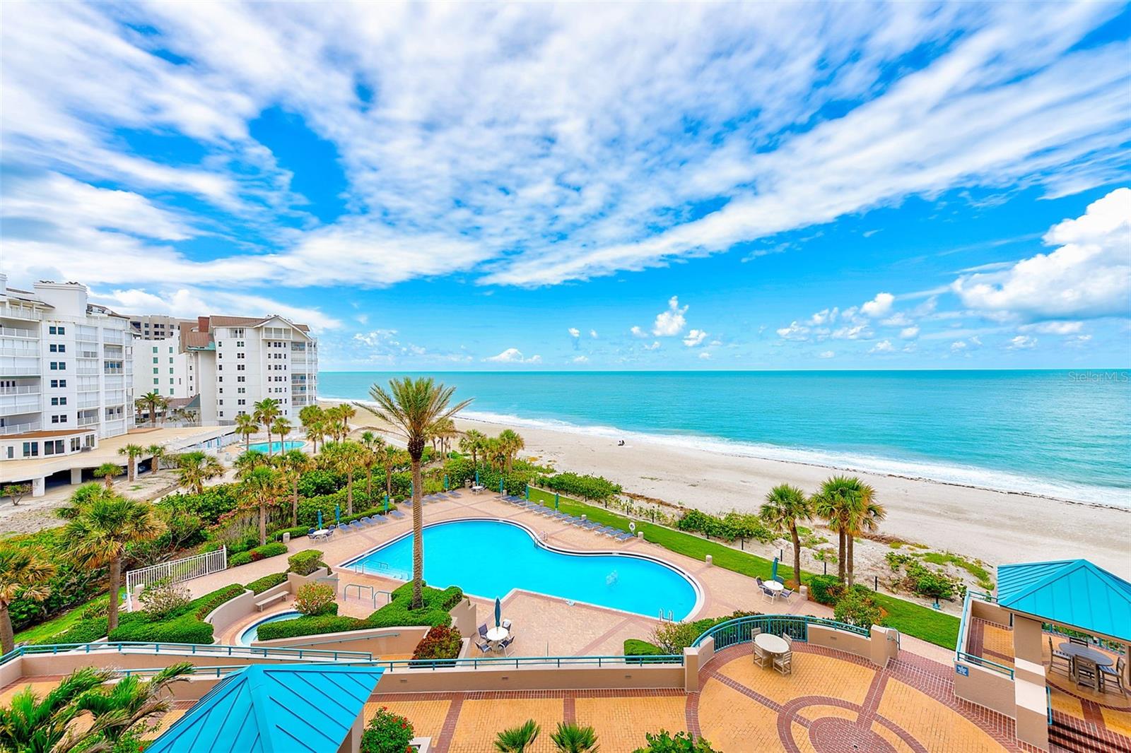 BEACH FRONT ANNUAL RENTAL! Step into luxury living on the highly sought-after Sand Key Beach in Clearwater. This exquisite fifth-floor residence offers sweeping, unobstructed views of the Gulf and pristine beach, best enjoyed from your expansive private terrace—perfect for greeting the Florida sunrise or unwinding with a golden sunset.This move-in-ready condominium seamlessly blends elegance with comfort. Designed for both relaxation and entertaining, the open-concept kitchen, living, and dining areas create a warm, inviting space ideal for gatherings with family and friends.But the luxury doesn’t stop there. As a resident of the prestigious Ultimar 3, you'll enjoy access to world-class, resort-style amenities. Host unforgettable private events in the beautifully appointed entertainment room, complete with a full kitchen, bar, dual televisions, and ample seating. Stay active and energized in the state-of-the-art fitness center, featuring strength and cardio equipment, sauna, steam rooms, and a whirlpool spa.For more leisurely pursuits, retreat to the third-floor TV lounge or billiards room. Outdoors, immerse yourself in Florida's natural beauty with three heated pools (including a lap pool), tennis courts, a putting green, and a basketball hoop. A 24/7 attended guard pavilion ensures peace of mind, while direct beach access places the Gulf’s tranquil shores right at your doorstep.
This exceptional unit also includes Storage Unit #403 and an under-building parking space (#12).