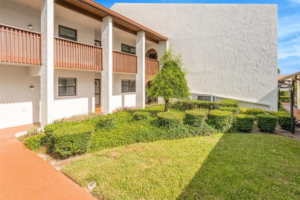 Photo of 7614 Radcliffe Circle #B113, Port Richey, FL 34668 (MLS # TB8538792)
