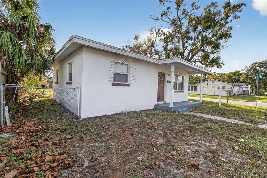 A beautifully renovated solid block home loaded with updates, rarely will you find a home this nice at this price in the same ZIP code. This charming residence offers 2 bedrooms and 1.5 baths, plus a huge enclosed lanai (with permit) and easily usable as a third bedroom), providing almost 1,200 square feet total. Step inside to an inviting open-concept layout that seamlessly connects the living room, dining area, and kitchen—ideal for everyday living and entertaining. Abundant windows flood the home with natural light, creating a bright, warm, and airy atmosphere throughout.  The stylish kitchen features brand-new cabinets and generous counter space. Bathrooms have been tastefully upgraded with elegant design, modern fixtures, updated lighting, glass shower doors, and contemporary vanities. Renovated in 2025, this home boasts fresh interior paint, new glossy tile flooring, new vinyl flooring, updated bathrooms, new mirrors, sliding doors, closet doors, and new toilets and many more. The roof was replaced in 2015, and the A/C is only a few years old—everything is solid.  The owner bought it to live but plan change. This property qualifies for favorable homeowner’s insurance rates and is located in Flood Zone X (no flood insurance required). All the hard work has already been done—just move in and enjoy. Situated on a corner lot with rear alley access, the home offers ample parking, garden space, or potential RV/boat parking. No HOA. Conveniently located on 38th Ave N in St. Petersburg, just minutes from the I-275 ramp, restaurants, Home Depot, Lowe’s, shopping, schools, and parks. This move-in-ready gem is perfect for first-time buyers, downsizers, or savvy investors. With a mortgage under $300K and minimal ongoing expenses, this home is an excellent opportunity. I work with many lenders including conventional lenders and hard-money programs. Schedule your private showing today—this one won’t last at this price!